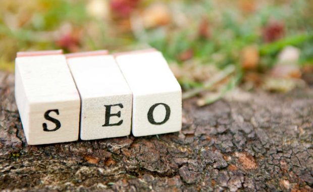 three blocks laying on dirt representing organic SEO which is key to any good dental marketing campaign