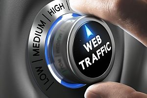 a digital marketer increasing a dial labeled web traffic to represent the effective organic SEO strategy that his firm is practicing