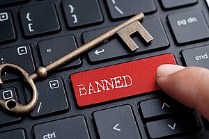 a key on a keyboard that says banned which represents the dangers of malicious search engine optimization techniques