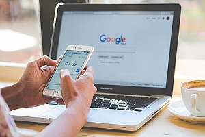 a business man using google to research about white hat seo