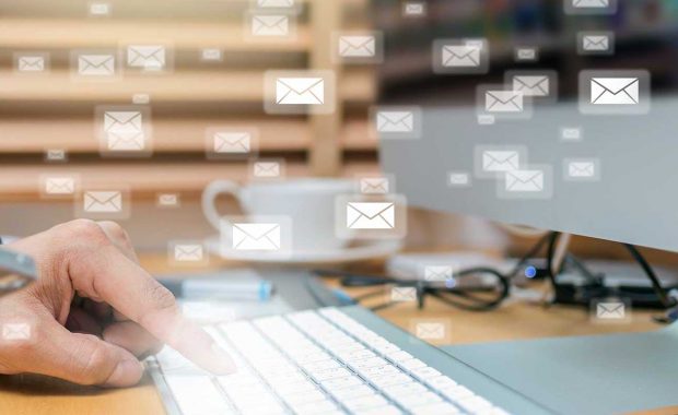Insurance agent performing email marketing in 2020