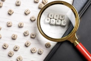 keywords letters blocks under magnifying glass