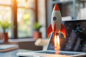 rocket from laptop on office table